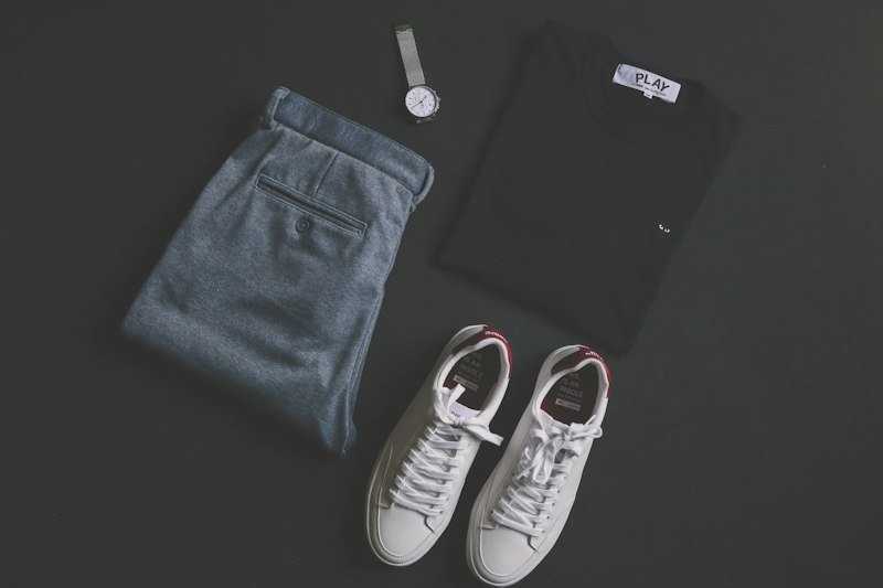 A curated rail of clothes in neutral colors