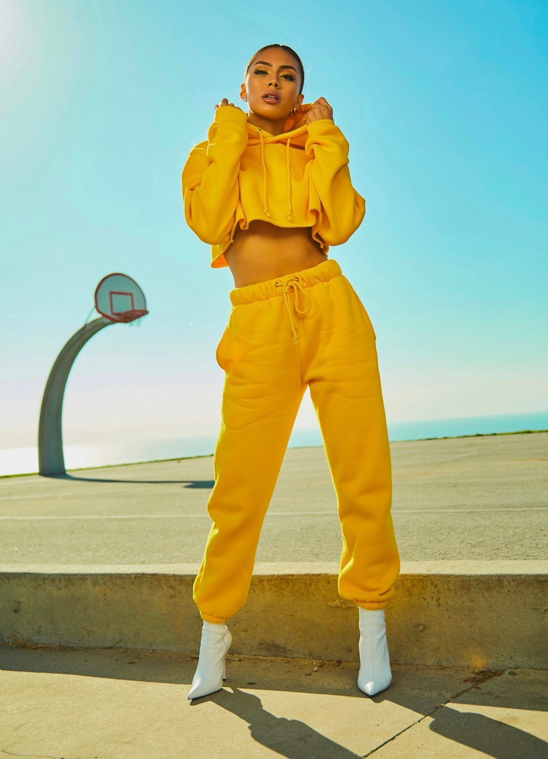 A bold yellow outfit styled for a confident week